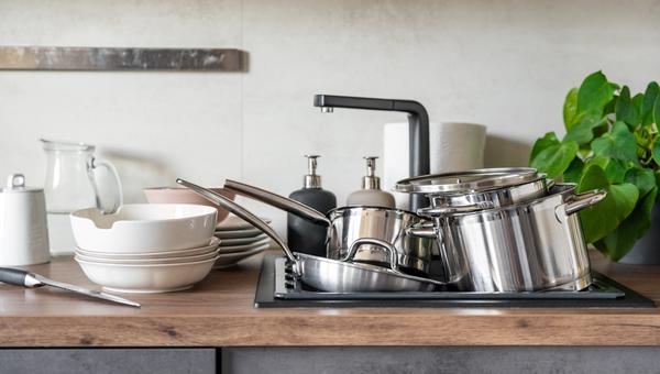 Dirty dishes and unwashed kitchen appliances