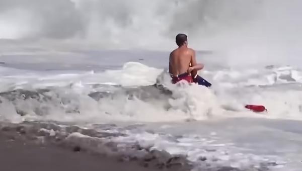Teen lifeguard rescue