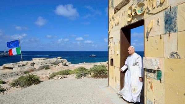 Pope Leo XIV walking through the arch of the monument Door of Europe - Porta d'Europa made by the italian artist Mimmo Paladino during a one day visit to Lampedusa island, south of Sicily.