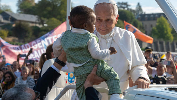 pope-leo-xiv-blesses-child-popemobile-sanctuary-our-lady-lourdes-france-september-27-2026
