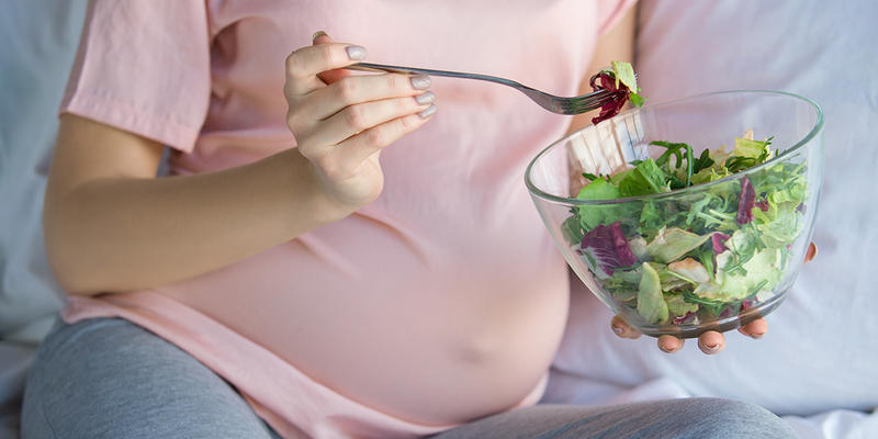 Pregnant Woman Eating