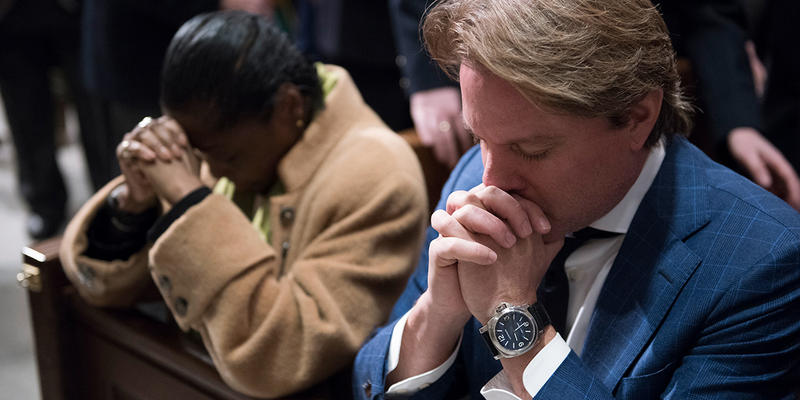 MAN PRAYING