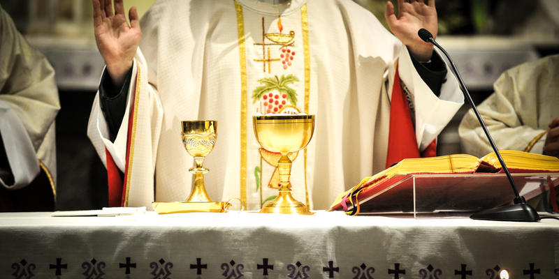 PRIEST WITH ALTER