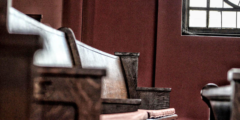 EMPTY CHURCH PEW