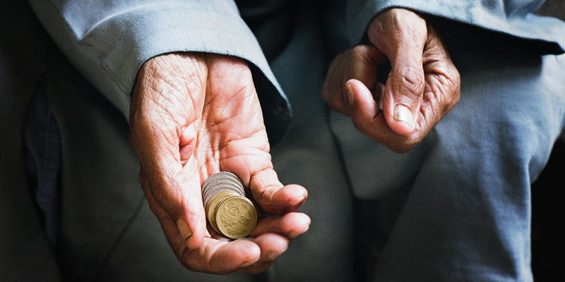 Old Man Holding Money