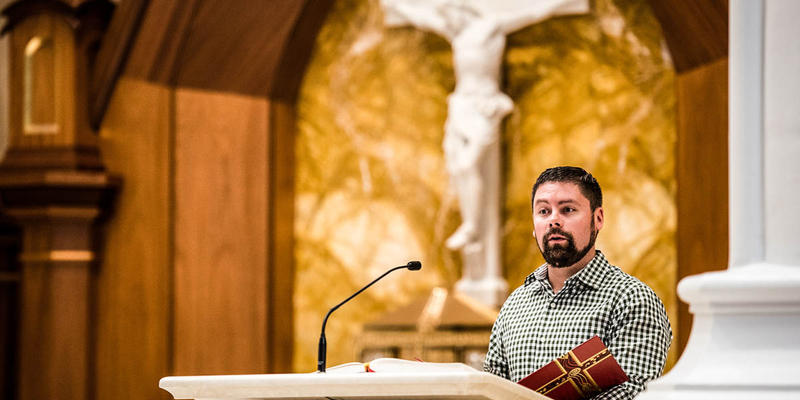 MAN AT MASS