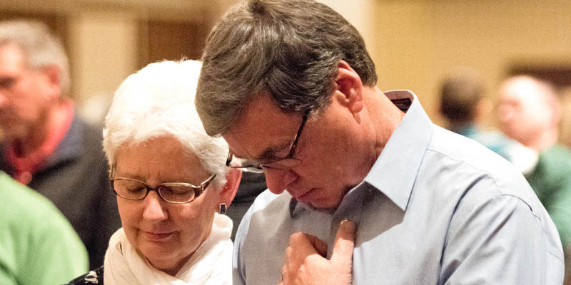 MAN AND WOMAN,PRAYING