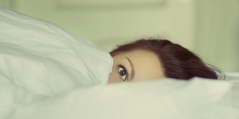 WOMAN,BED,AWAKE