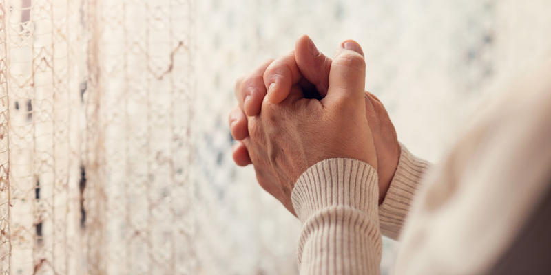 WOMAN,HANDS,PRAYER