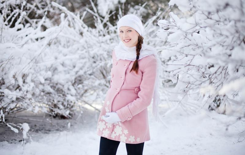 Pregnant woman in winter