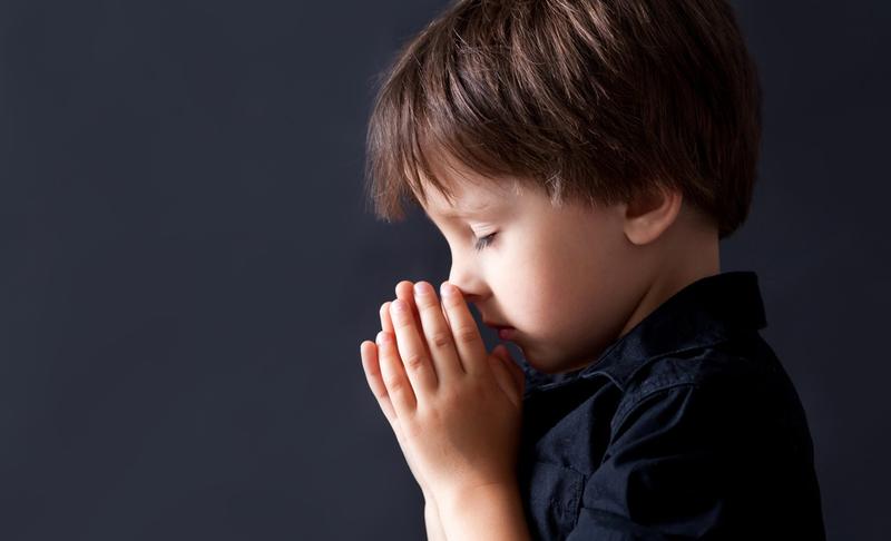 BOY PRAYING