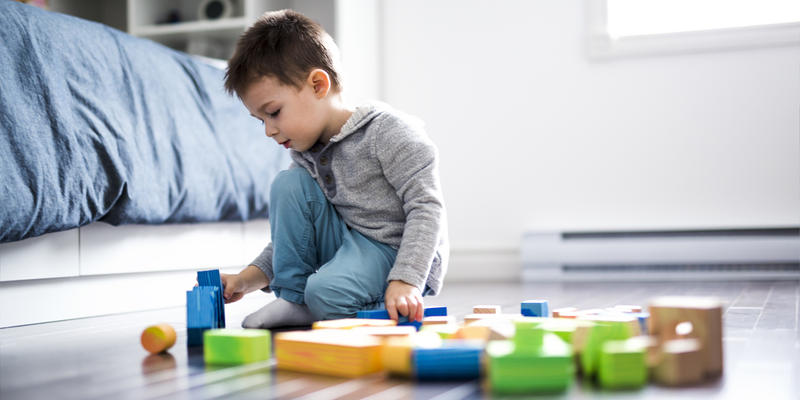 LITTLE,BOY,PLAYING,ALONE