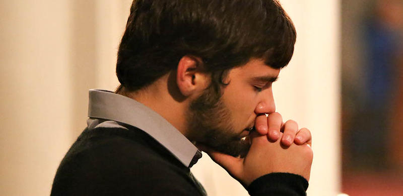 MAN PRAYING