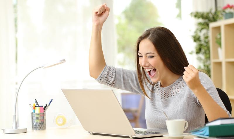 WOMAN BEHIND COMPUTER