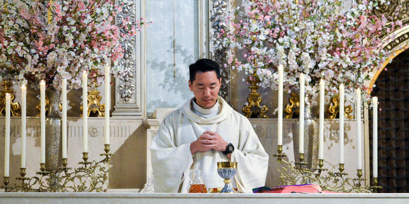 PRIEST AT ALTER