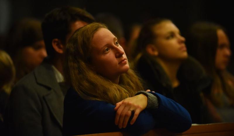 YOUNG WOMAN IN CHURCH