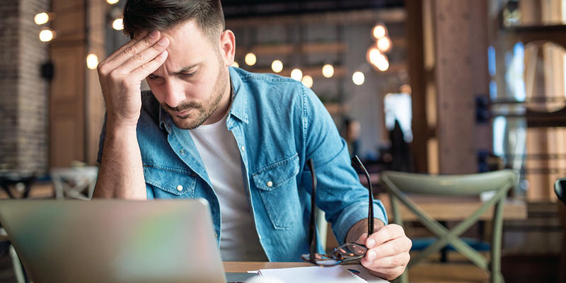 COLLEGE STUDENT STUDYING