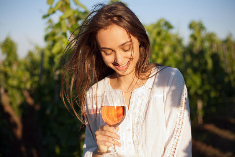 GIRL DRINKING WINE