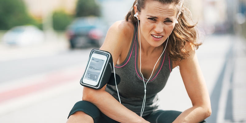 WOMAN RESTING FROM RUNNING
