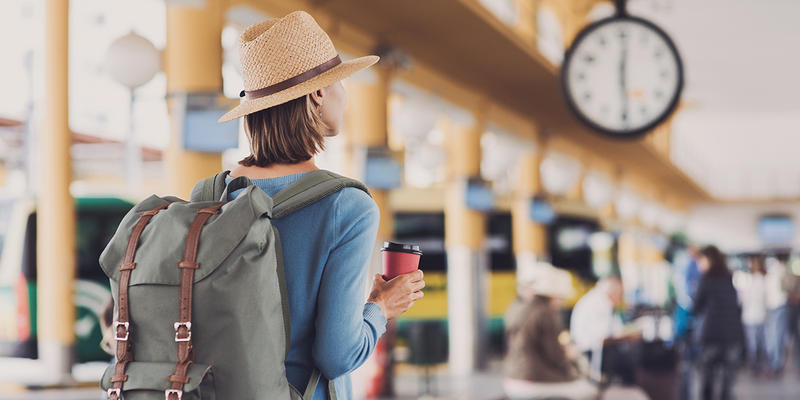 WOMAN,TRAIN STATION