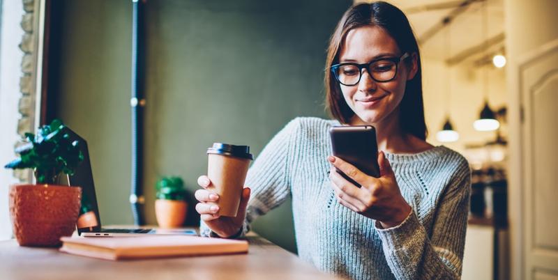 WOMAN READING NEWS
