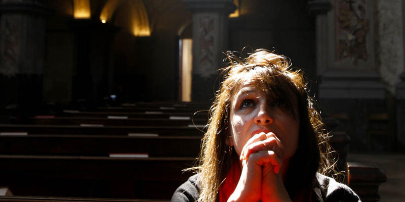 WOMAN PRAYING
