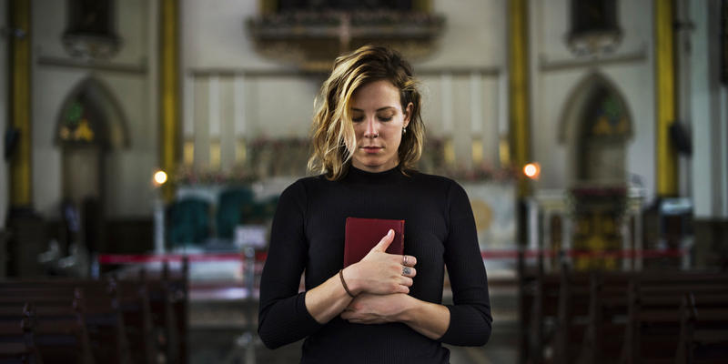 WOMAN PRAYING