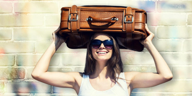 WOMAN WITH SUITCASE