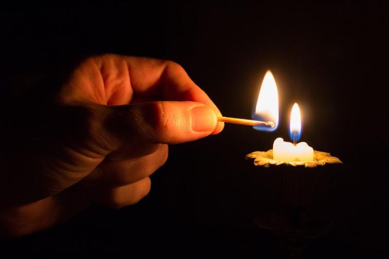 LIGHTING CANDLE