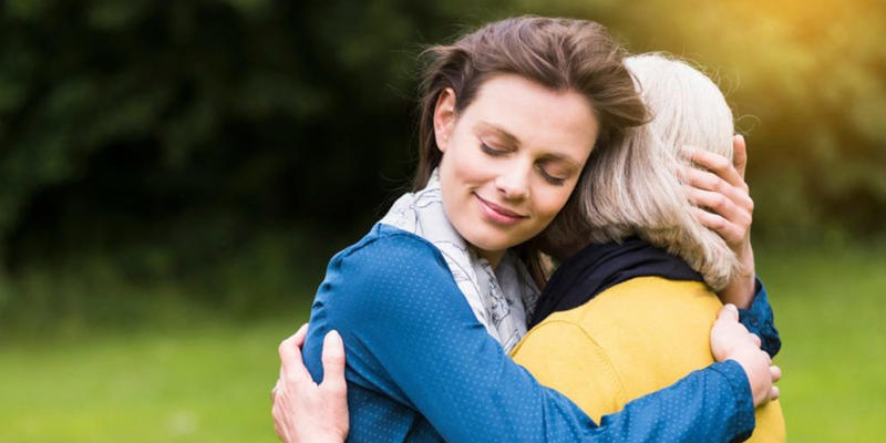 HUGGING