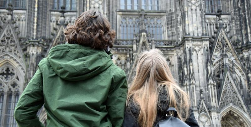 COUPLE IN FRONT OF CATHEDRAL