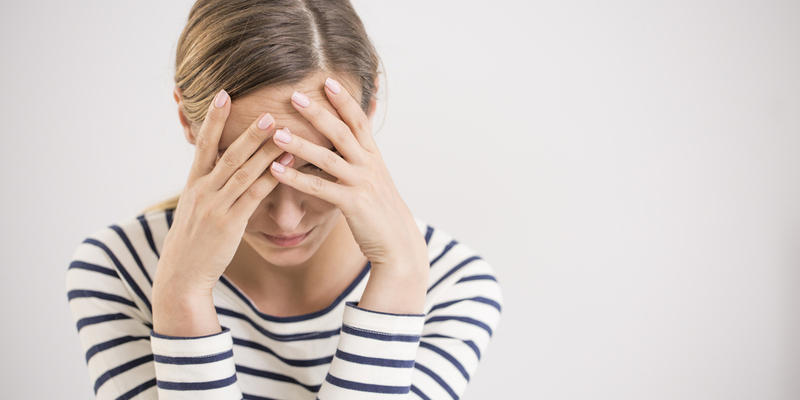 WOMAN SUFFERING
