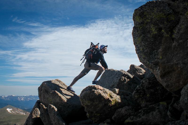 MAN CLIMBING