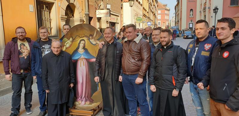 MAN,ROSARY,WARSAW,POLAND