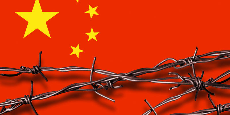 CHINA'S FLAG WITH BARBED WIRE