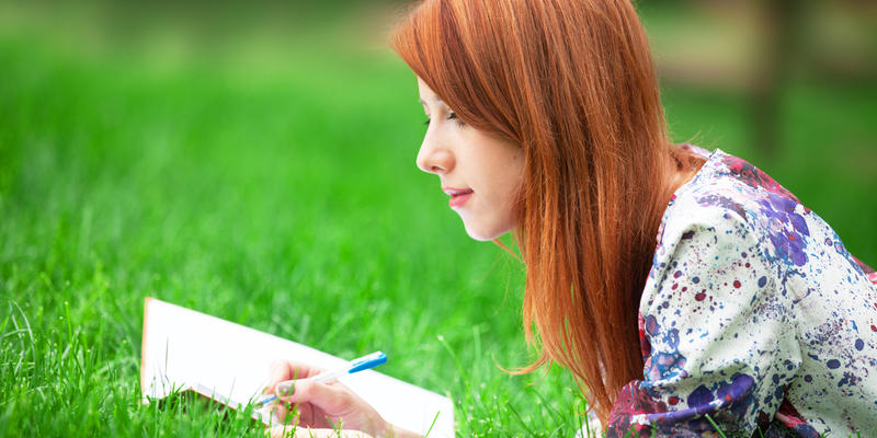redhead girl writing