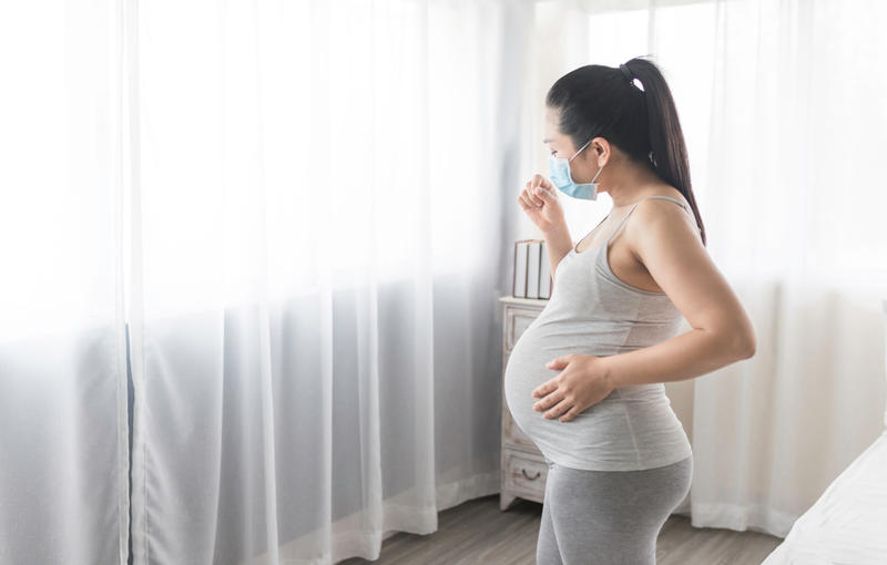 PREGNANT ASIAN FEMALE