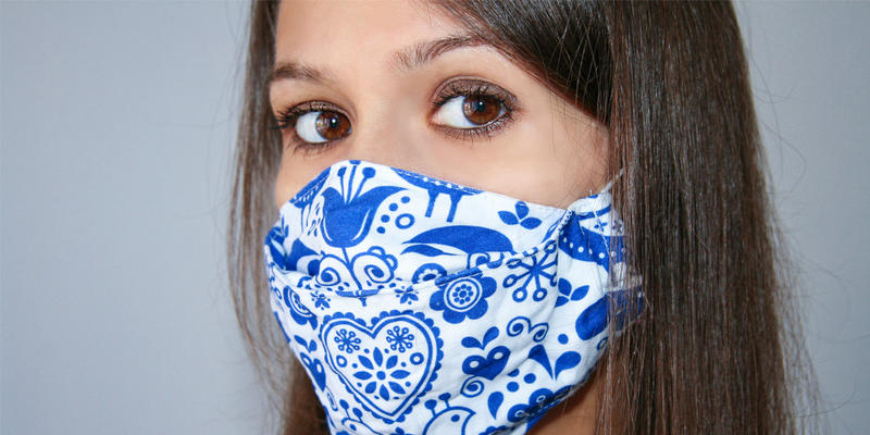 YOUN WOMAN WITH MEDICAL MASK,