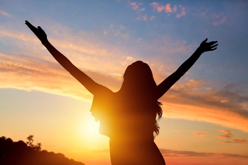 woman with raising hands