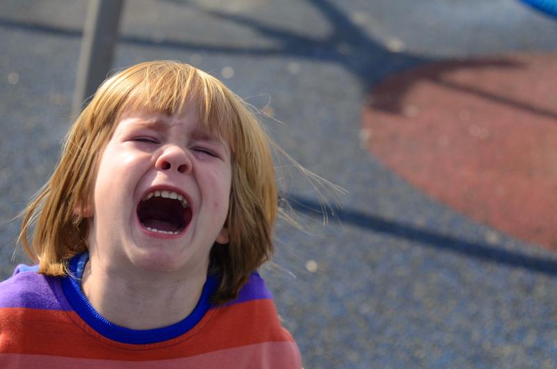 The little boy is screaming, crying a lot. Children's whims, tantrums